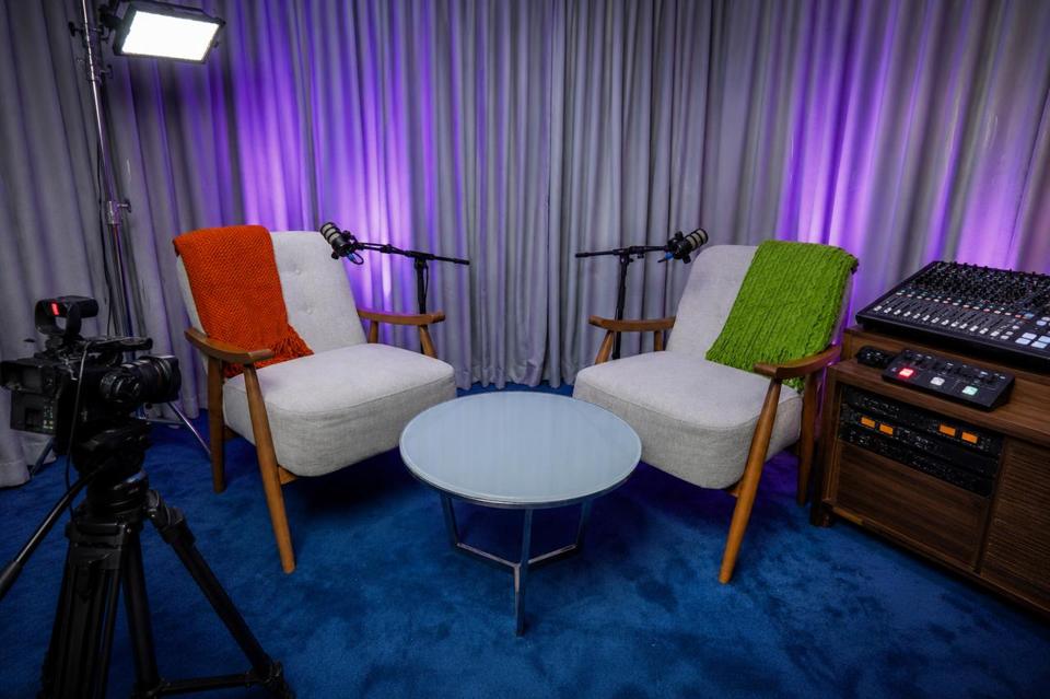 The Casa Media Network set in Nairobi lit for a recorded conversation, with two chairs on microphone, a studio camera on the shot and the sound rack alongside.
